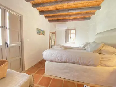 Cama o camas de una habitación en Renovated house in the historic center