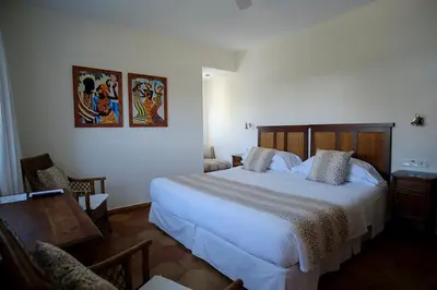 Cama o camas de una habitación en miKasa Agua Amarga & SPA