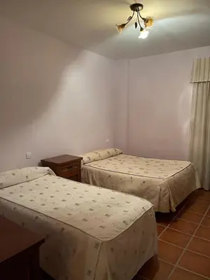 Cama o camas de una habitación en Albergue Rural Gorillo