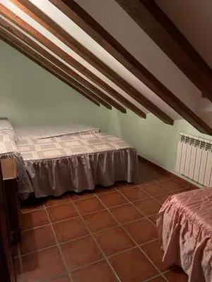 Cama o camas de una habitación en Albergue Rural Gorillo