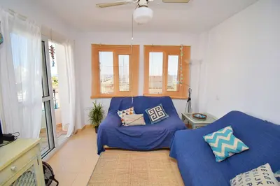 Cama o camas de una habitación en EXPOHOLIDAYS - VISTAS AL PUERTO DEPORTIVO GALERA
