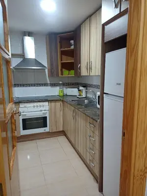 Una cocina o zona de cocina en Alojamiento roquetas de mar
