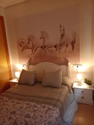 Cama o camas de una habitación en Alojamiento roquetas de mar