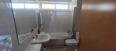 Un baño de TOYO Apartamento golf y playa