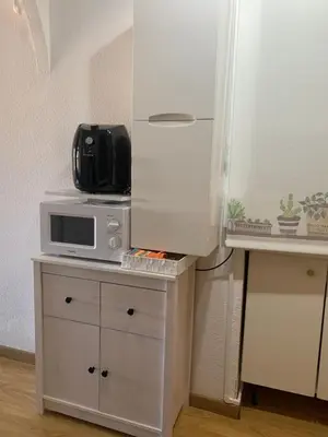 Una cocina o zona de cocina en Estudio Roquetas