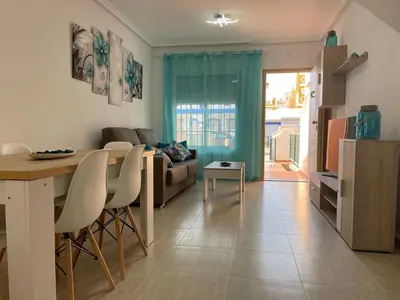 Zona de estar de Adosado playa, geoda y Aguilas cerca, con barbacoa y piscina en San Juan de los terreros