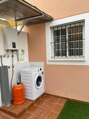 Una cocina o zona de cocina en Adosado playa, geoda y Aguilas cerca, con barbacoa y piscina en San Juan de los terreros