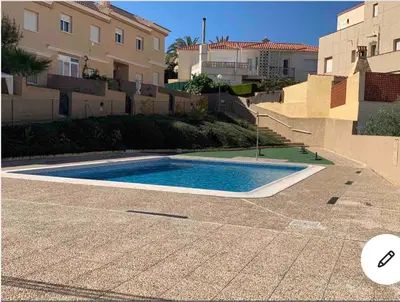 Piscina en o cerca de Adosado cerca de la playa y club de buceo con piscina en calabardina, Aguilas