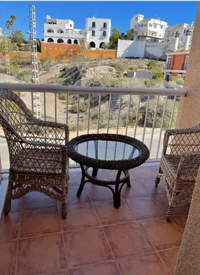 Un balcón o terraza de Adosado cerca de la playa y club de buceo con piscina en calabardina, Aguilas