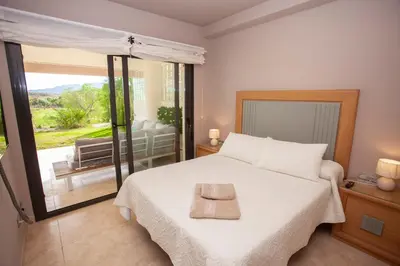 Cama o camas de una habitación en Vera-Mojácar Valle del Este Resort Golf & SPA