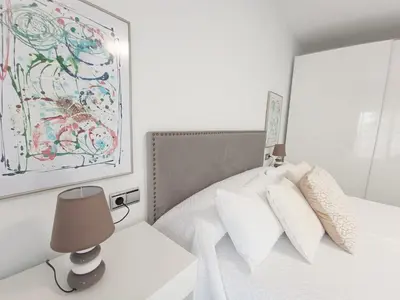 Cama o camas de una habitación en Expoholidays- Primera línea con parking incluido