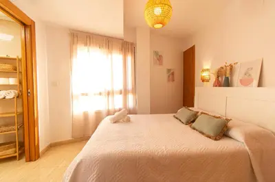 Cama o camas de una habitación en Terraza en Avenida Principal y junto a la Playa - by Aloha Palma
