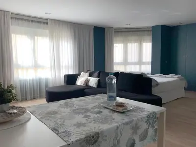 Cama o camas de una habitación en Al_reparo Home Beach _ Adra