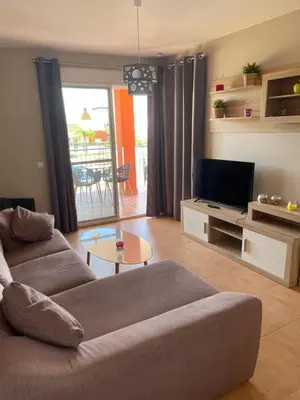 Una televisión o centro de entretenimiento en Modern apartment- Vera Playa