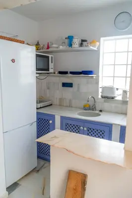 Una cocina o zona de cocina en Casa de la Rosa