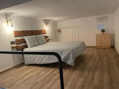Cama o camas de una habitación en Precioso loft en Olula del Río