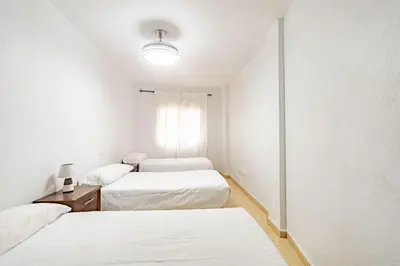 Cama o camas de una habitación en Avenida Principal con Aire Acondicionado, Wifi y Parking - by Aloha Palma