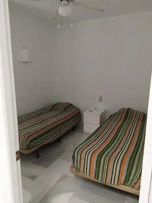 Cama o camas de una habitación en Cortijo13 dúplex de lujo, Puerto Rey