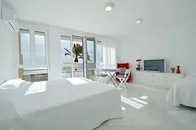 Cama o camas de una habitación en Orilla playa aguadulce