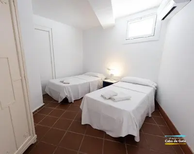 Cama o camas de una habitación en CASA ESCUELA PLAYA