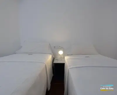 Cama o camas de una habitación en CASA ESCUELA PLAYA