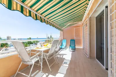 Un balcón o terraza de TrendyHomes Puerto - Vistas al mar, parking incluido, playa a un paso
