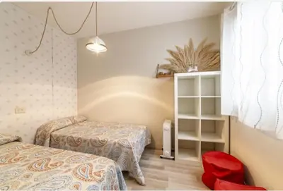 Cama o camas de una habitación en Casa Iribarne