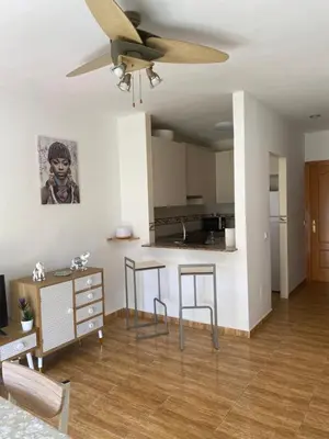 Una cocina o zona de cocina en Acogedor apartamento en el paraiso