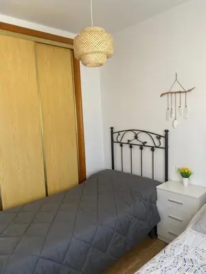Cama o camas de una habitación en Acogedor apartamento en el paraiso