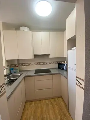 Una cocina o zona de cocina en Acogedor apartamento en el paraiso