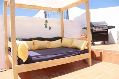 Zona de estar de Cortijo naturista con vistas-clothing optional