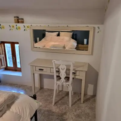 Cama o camas de una habitación en Cortijo naturista con vistas-clothing optional