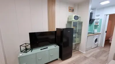 Una televisión o centro de entretenimiento en Apartamento Luz de Luna Aguadulce