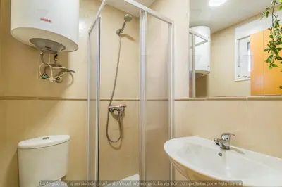 Un baño de Duplex PARAISO VERA Playa PISCINA PRIVADA