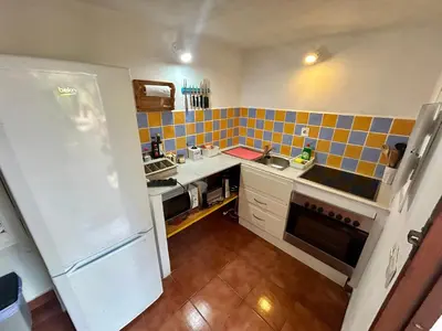 Una cocina o zona de cocina en La Washingtonia