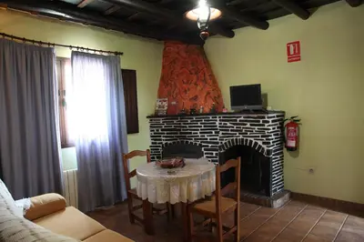 Una televisión o centro de entretenimiento en Turismo Rural & SPA El Cercado