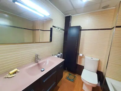 Un baño de Amplia Terraza con Piscina, Garaje y Aire Acondicionado - by Aloha Palma