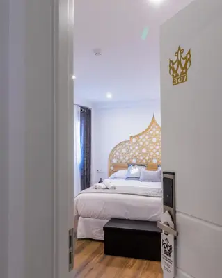 Cama o camas de una habitación en Hotel Reina Aixa