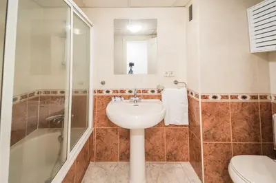 Un baño de Expoholidays - Plaza Santa Rita