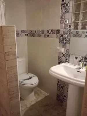 Un baño de CORTIJO Rural MOLINO EL TARAHAL con piscina y zonas compartidas