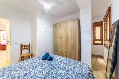 Cama o camas de una habitación en Casa Gómez, parking gratuito en Pleno Centro