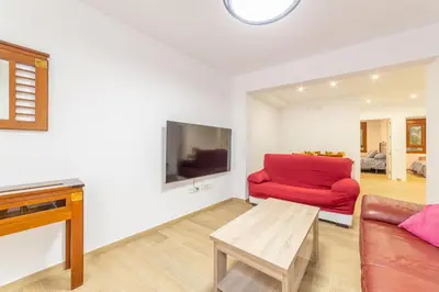 Una televisión o centro de entretenimiento en Casa Gómez, parking gratuito en Pleno Centro