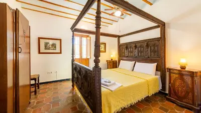 Cama o camas de una habitación en Cortijo Rural Urrá Sorbas by Ruralidays