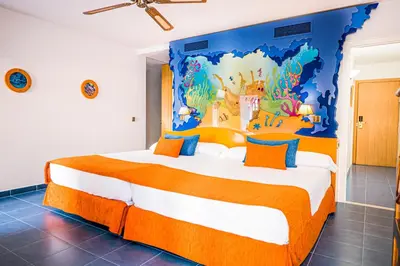 Cama o camas de una habitación en Diver Roquetas