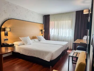 Cama o camas de una habitación en Nuevo Torreluz
