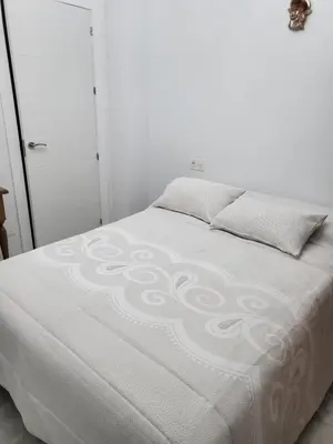 Cama o camas de una habitación en Paradise of Dreams Apartamentos - LA CARRERA