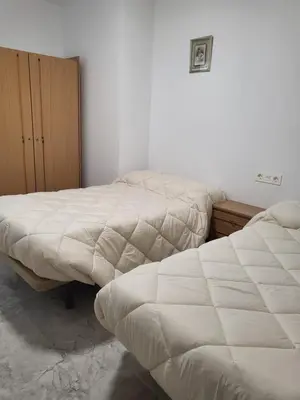 Cama o camas de una habitación en Paradise of Dreams Apartamentos - LA CARRERA