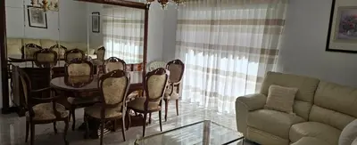 Zona de estar de Paradise of Dreams Apartamentos - LA CARRERA