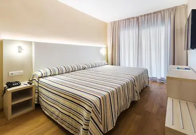 Cama o camas de una habitación en Hotel Best Sabinal