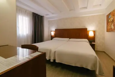 Cama o camas de una habitación en Torreluz Centro